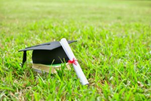 graduate diploma and cap
